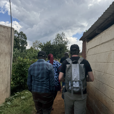 Walking to meet a family as part of our community visits.