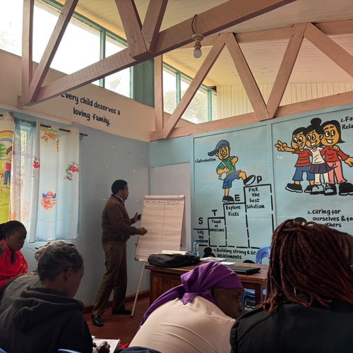 Guardians learning practical parenting skills through our STEP framework.