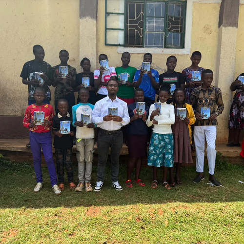 Children rooted in faith, holding the Word close.